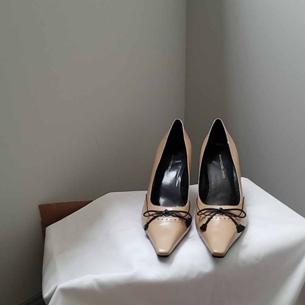 Beige and Black pumps
